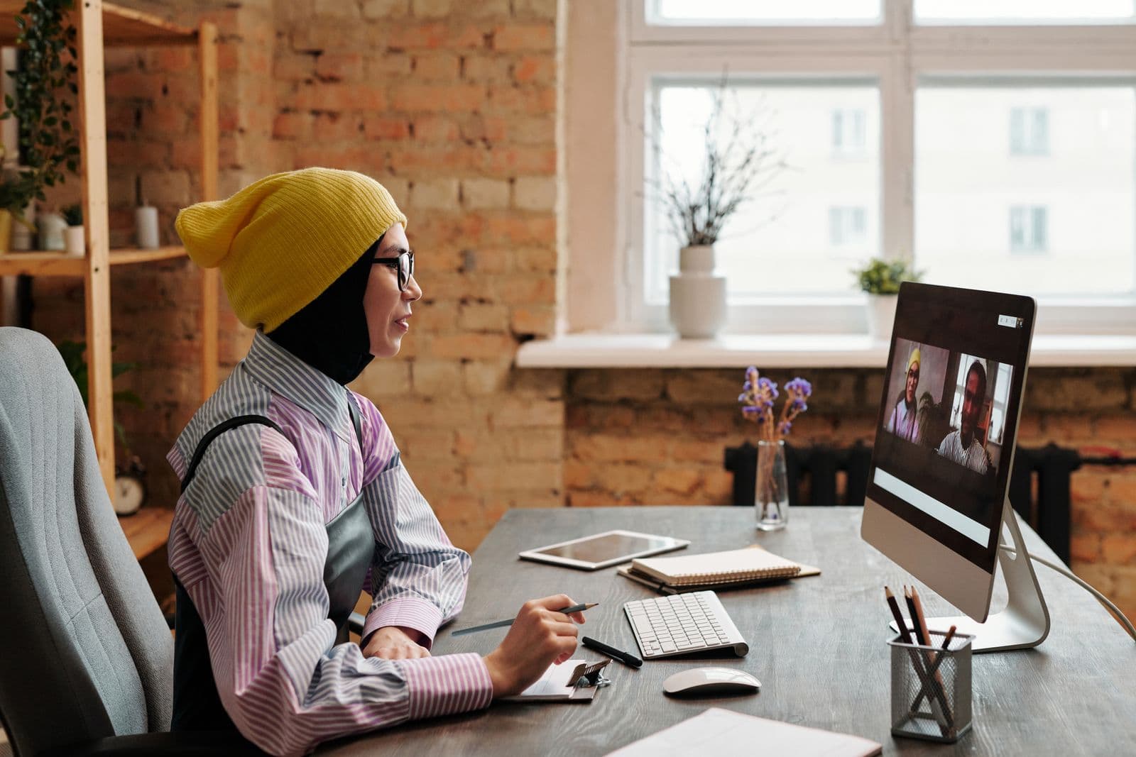 A video interview open on a desktop monitor